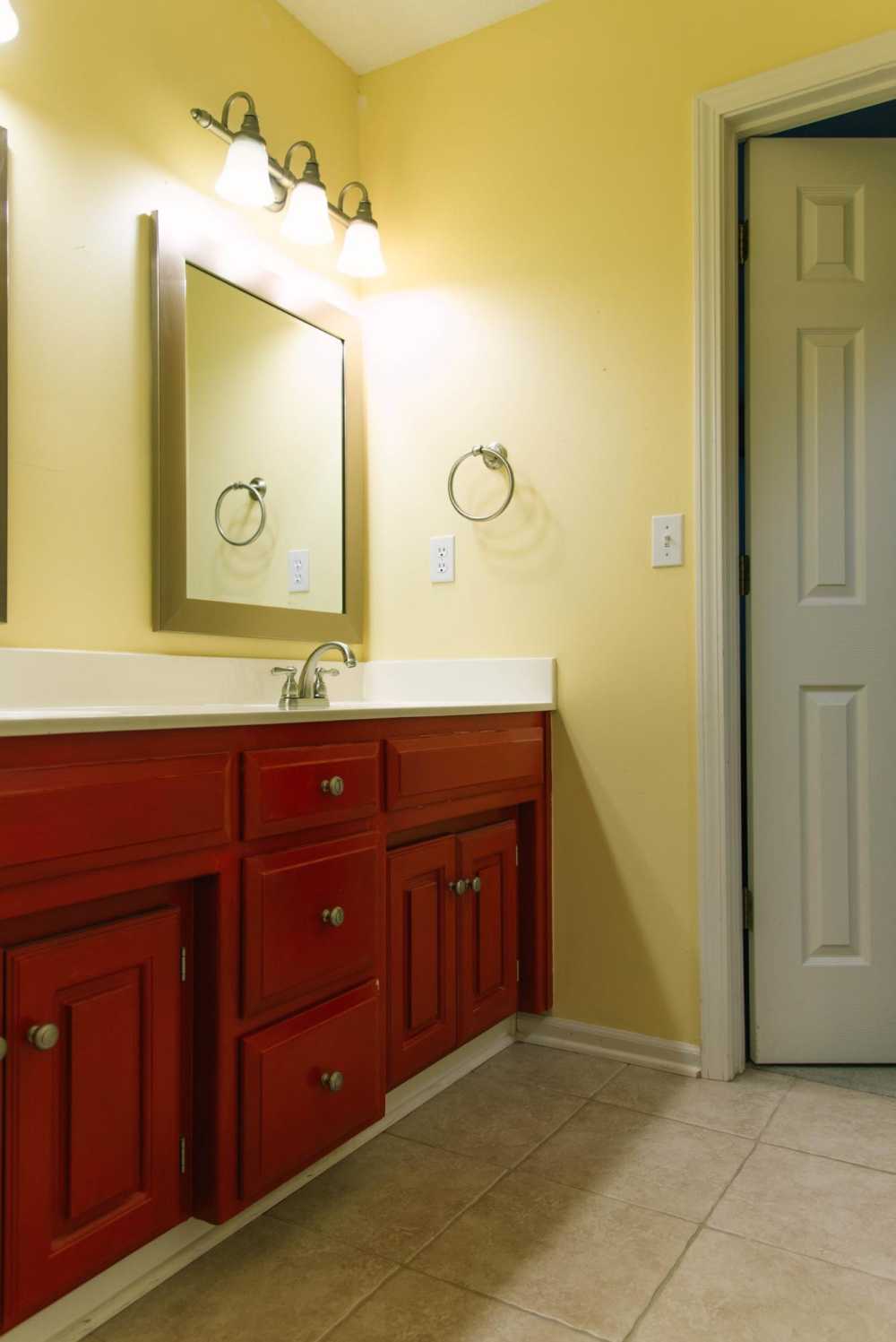 soft yellow yellow and grey bathroom