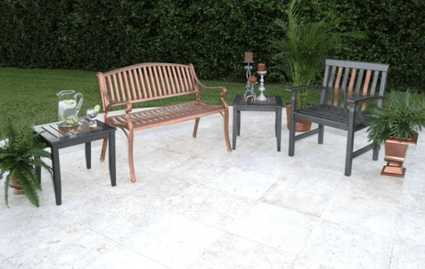 outside bench with green yard and tiled porch