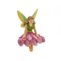 Sunshine Fairy Girl Sitting In Pink Petal Skirt And Green Shirt