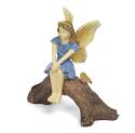 Fairy Girl Sitting On Log