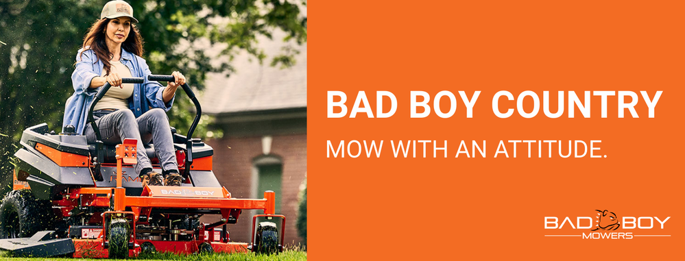 A woman mowing lawn with a zero turn mower. Bad boy country. Mow with an attitude.