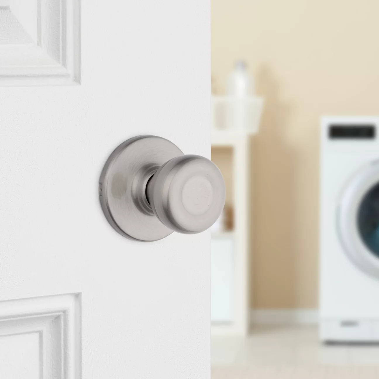 Satin chrome passage door knob.