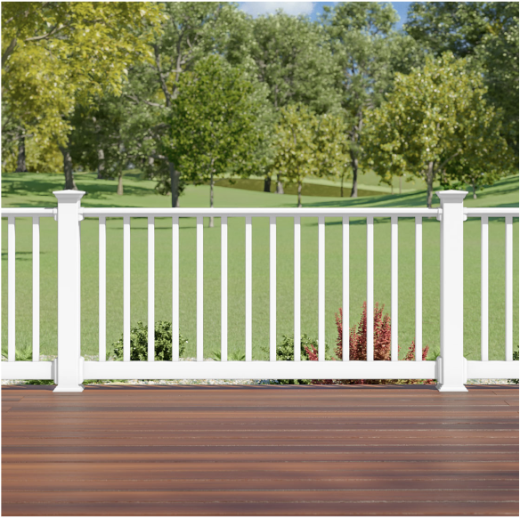 White deck railing looking out to a green backyard.
