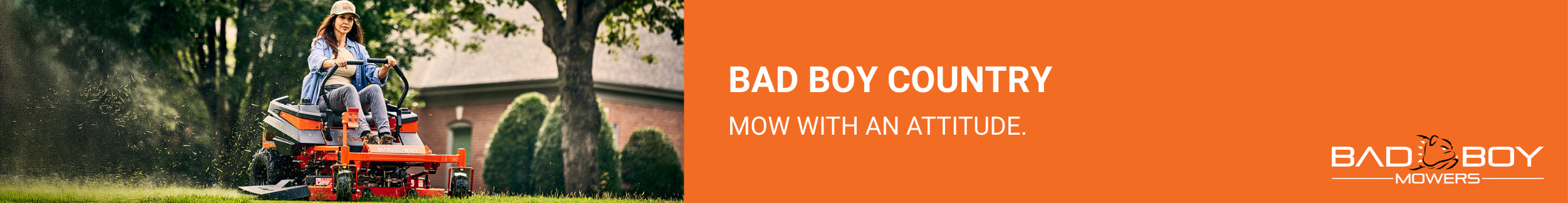 A woman mowing lawn with a zero turn mower. Bad boy country. Mow with an attitude.