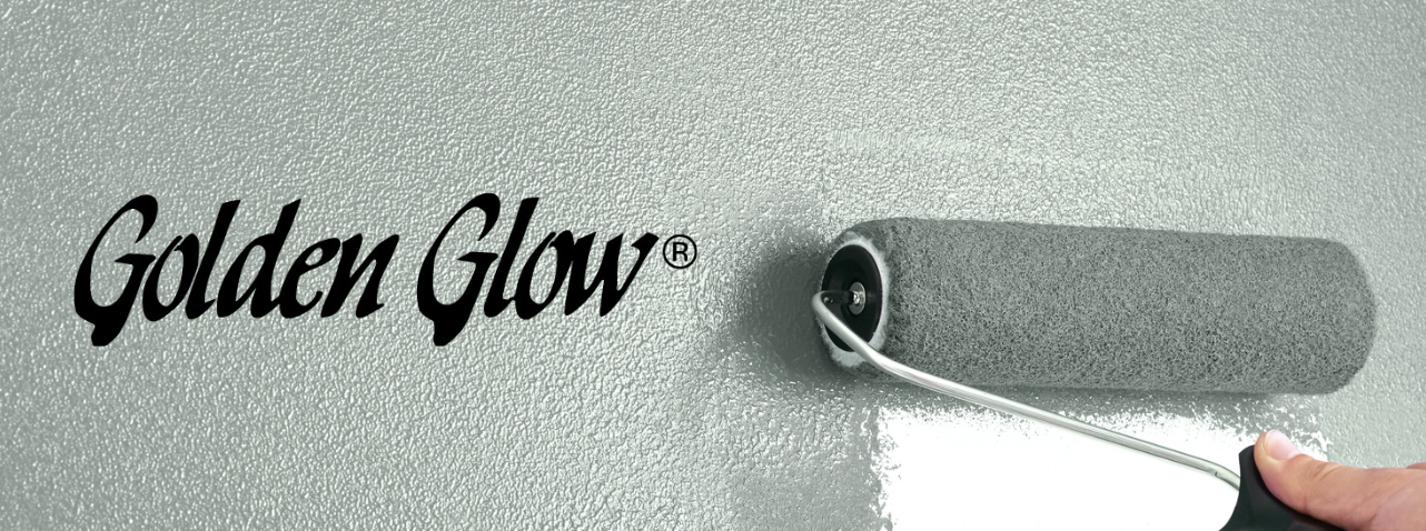 Someone using a paint roller to paint a wall green.