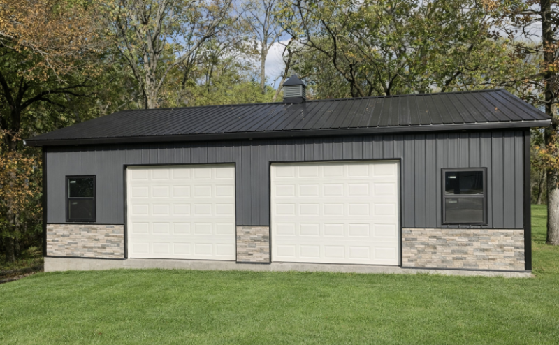 Finished two-door garage with stone wainscot.