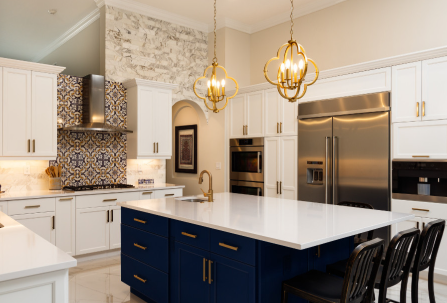 A sleek and classy white and navy kitchen.
