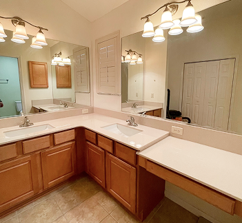 White bathroom counter with a slab