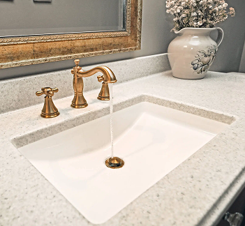 Beautiful bathroom sink with gold fixtures