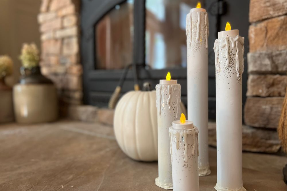 Four PVC pipes made into halloween candles.